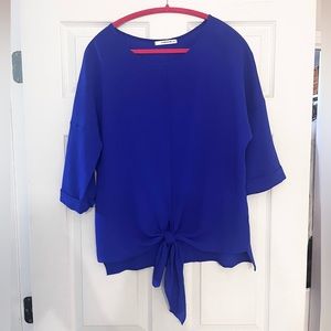 Blue blouse with tie front detail. Size small